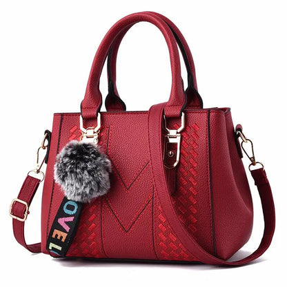 Women’s Embroidered Leather Messenger Bag with Pom Pom Detail