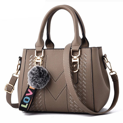 Women’s Embroidered Leather Messenger Bag with Pom Pom Detail