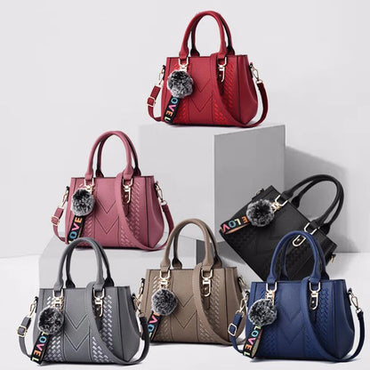 Women’s Embroidered Leather Messenger Bag with Pom Pom Detail
