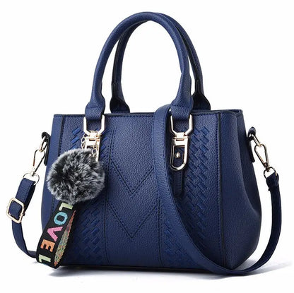 Women’s Embroidered Leather Messenger Bag with Pom Pom Detail