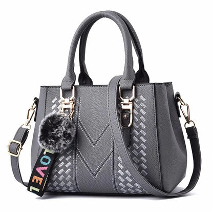 Women’s Embroidered Leather Messenger Bag with Pom Pom Detail
